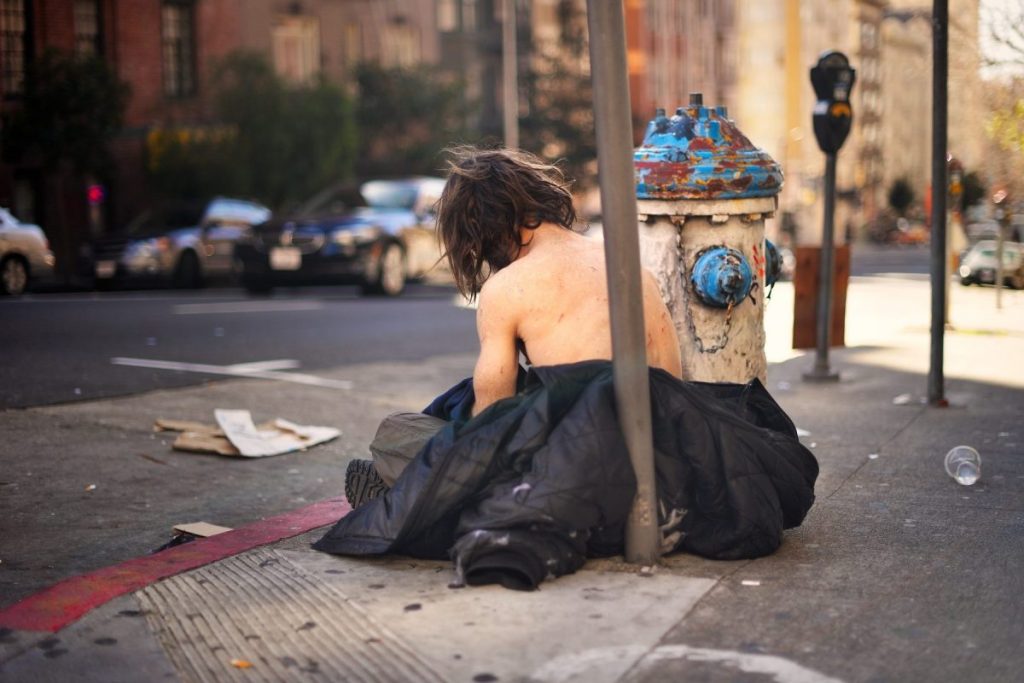 A homeless man on the street in San Francisco's Tenderloin. Photo by Euan Slorach via Creative Commons